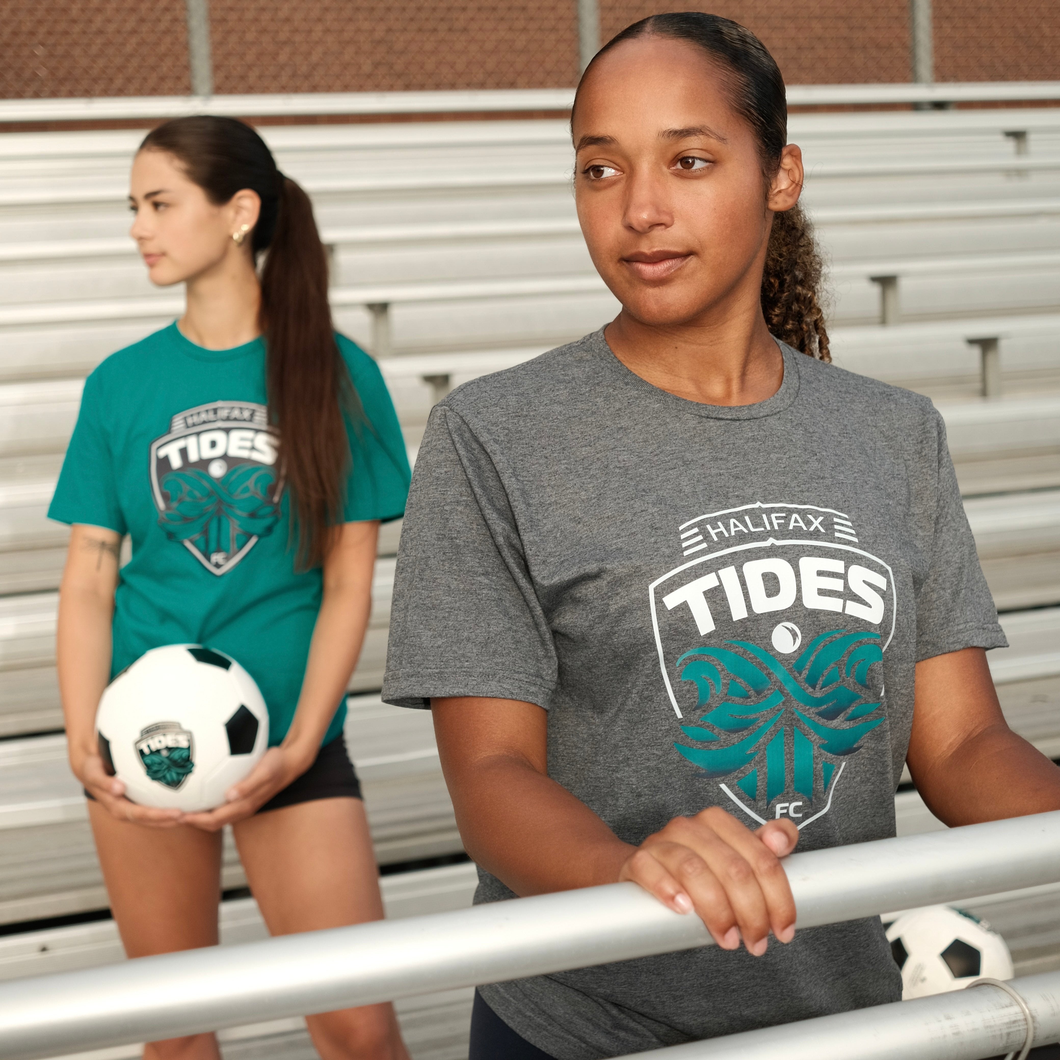 Girls wearing Grey & Teal Halifax Tides FC Shirts 