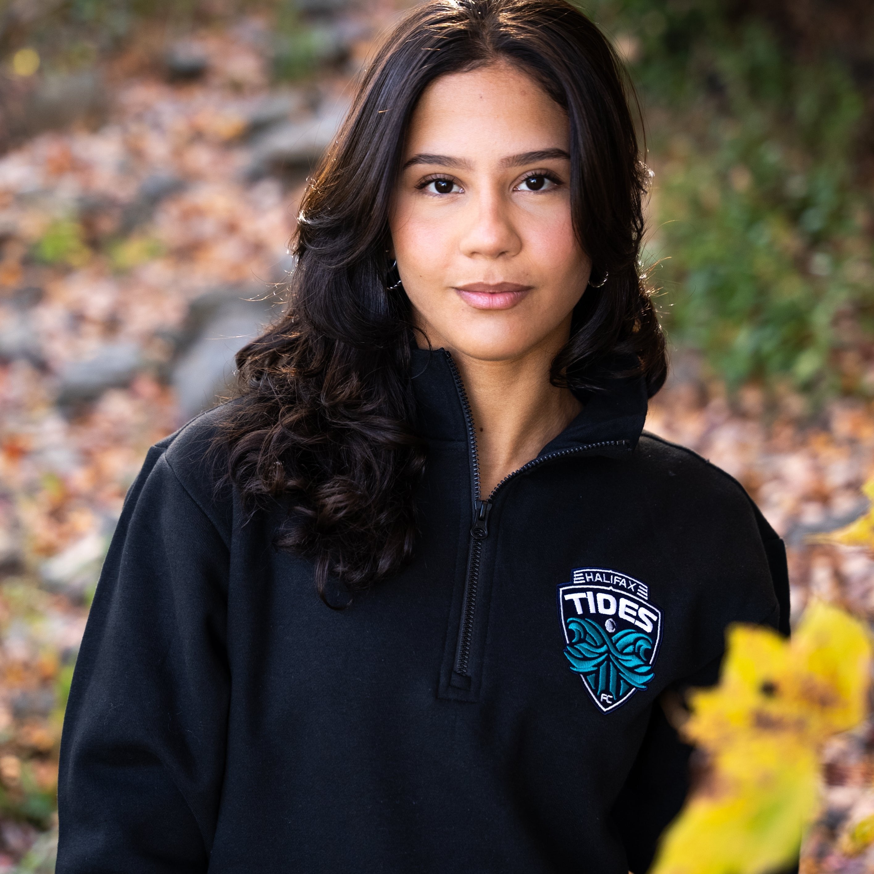 Women Wearing Halifax Tides FC Quarter Zip in fall weather